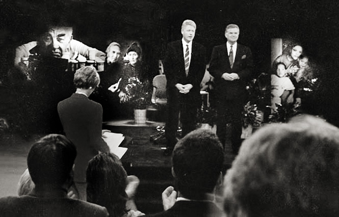 President Clinton in a national CNN Broadcast, Oct. 1993. Ten of Corser's photographs, from the exhibition "A Matriot's Dream: Health Care for All," were enlarged and used on the set with the President, as well as the exhibition showing in the Rotunda of Congress.