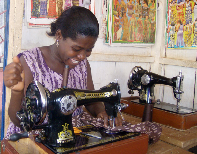 Global Mamas producer Janet Aba Sagoe sewing with her hand-powered machine